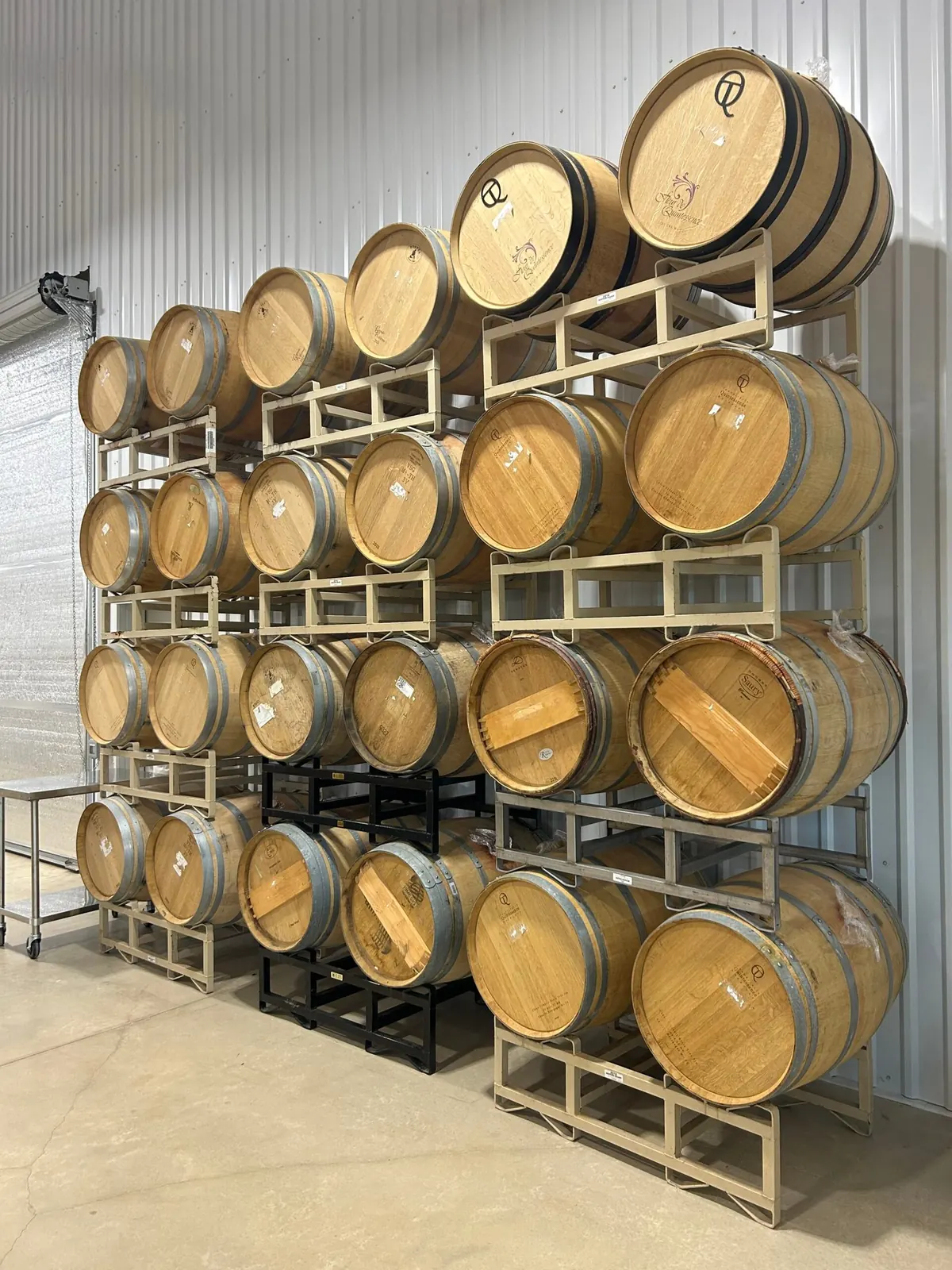 Oak barrels in a winery cellar