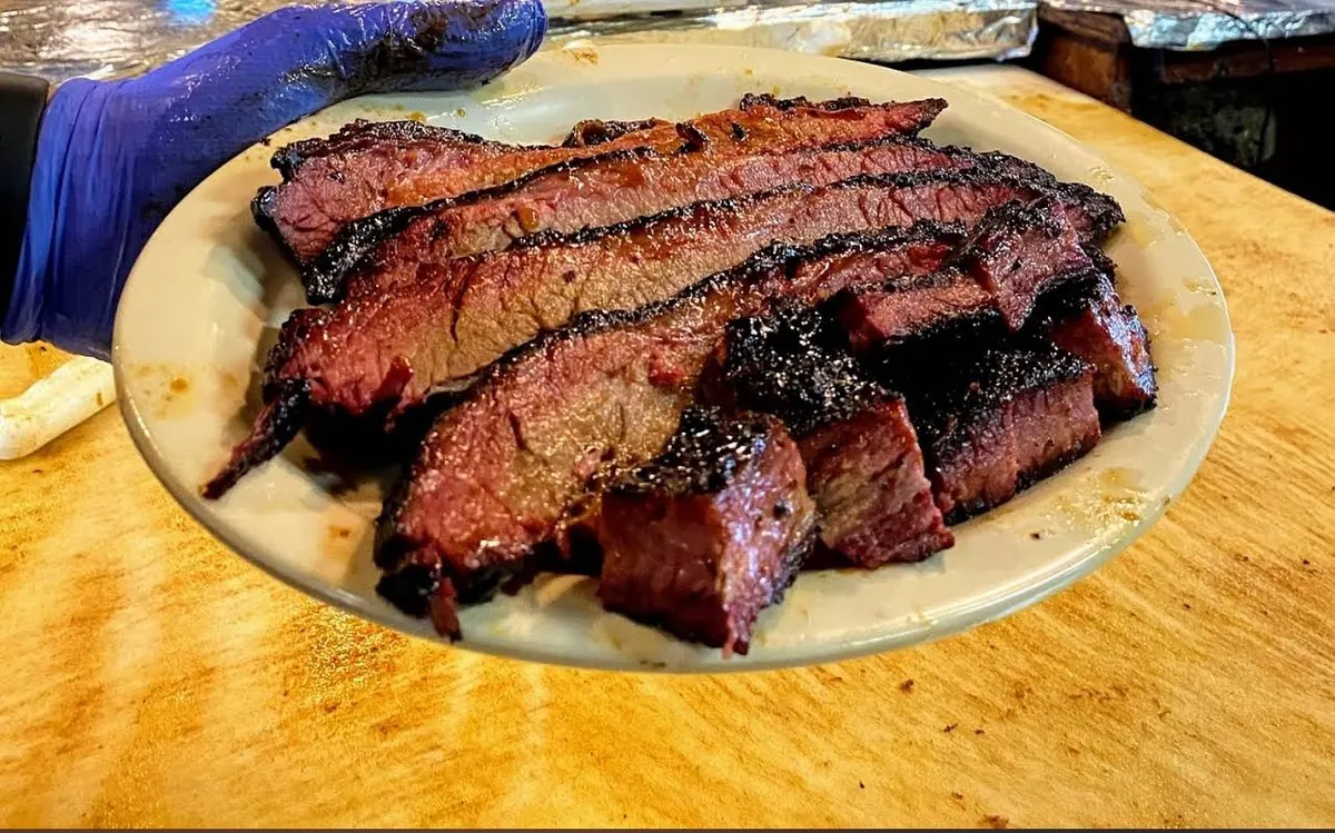 Texas brisket sliced on a board